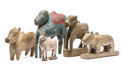 Lot 75 - FIVE CARVED WOOD FIGURES OF NANDI BULL, INDIA, 19TH/20TH CENTURY