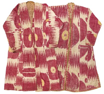 Lot 132 - A LADY'S AND A SIMILAR MAN'S QUILTED IKAT CHAPAN, UZBEKISTAN, BOKHARA, SECOND HALF 19TH CENTURY
