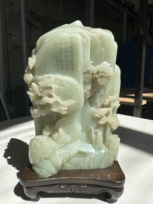 Lot 24 - A CHINESE IMPERIALLY INSCRIBED JADE MOUNTAIN, QING DYNASTY