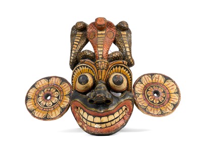 Lot 506 - A CARVED AND PAINTED WOOD RITUAL MASK, SRI LANKA, 19TH CENTURY