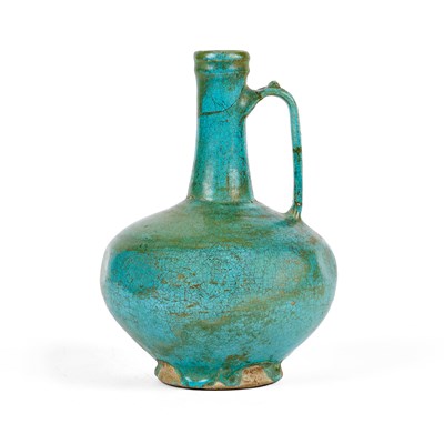 Lot 70 - A KASHAN TURQUOISE GLAZED POTTERY EWER, PERSIA, 12TH/13TH CENTURY