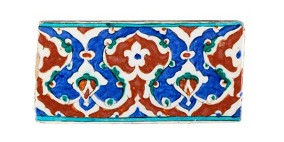 Lot 108 - AN IZNIK BORDER TILE, OTTOMAN ANATOLIA, LATE 16TH CENTURY