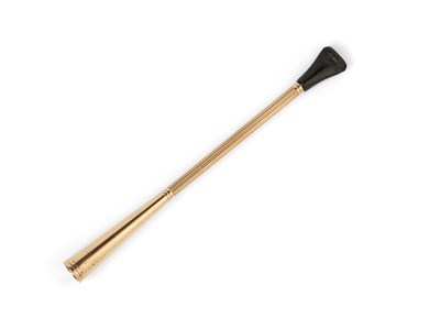 Lot 156 - CARTIER: A GOLD CIGARETTE HOLDER, CARTIER LTD., LONDON, 1965