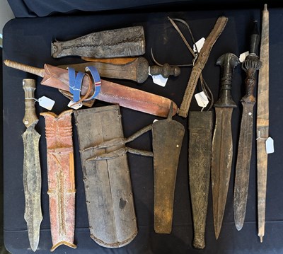 Lot 519 - THIRTY-FOUR VARIOUS AFRICAN DAGGERS, 20TH CENTURY AND LATER