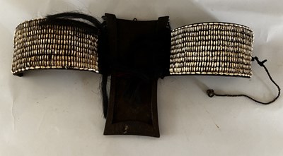 Lot 525 - AN AFRICAN (TUAREG) LEATHER BAG, AND A NAGA DAO HOLDER AND BELT, BOTH LATE 19TH/EARLY 20TH CENTURY