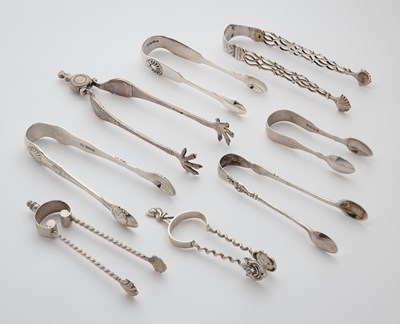Lot 705 - A GROUP OF EIGHT ENGLISH SILVER SUGAR TONGS