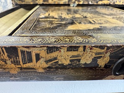 Lot 79 - A CHINESE EXPORT LACQUER GAMES BOX AND HINGED COVER, QING DYNASTY, 19TH CENTURY