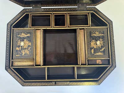 Lot 79 - A CHINESE EXPORT LACQUER GAMES BOX AND HINGED COVER, QING DYNASTY, 19TH CENTURY