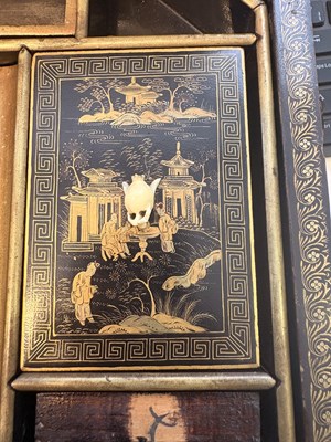 Lot 79 - A CHINESE EXPORT LACQUER GAMES BOX AND HINGED COVER, QING DYNASTY, 19TH CENTURY