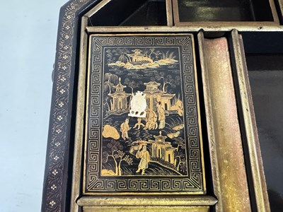 Lot 79 - A CHINESE EXPORT LACQUER GAMES BOX AND HINGED COVER, QING DYNASTY, 19TH CENTURY