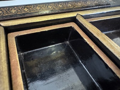 Lot 79 - A CHINESE EXPORT LACQUER GAMES BOX AND HINGED COVER, QING DYNASTY, 19TH CENTURY