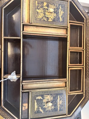 Lot 79 - A CHINESE EXPORT LACQUER GAMES BOX AND HINGED COVER, QING DYNASTY, 19TH CENTURY