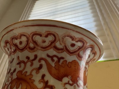 Lot 76 - A CHINESE IRON-RED 'LOTUS' VASE, QING DYNASTY, 19TH CENTURY