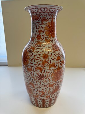 Lot 76 - A CHINESE IRON-RED 'LOTUS' VASE, QING DYNASTY, 19TH CENTURY