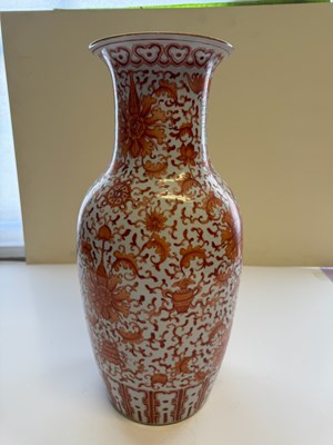 Lot 76 - A CHINESE IRON-RED 'LOTUS' VASE, QING DYNASTY, 19TH CENTURY