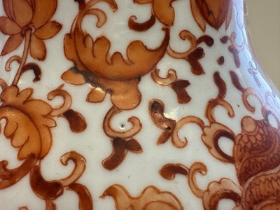 Lot 76 - A CHINESE IRON-RED 'LOTUS' VASE, QING DYNASTY, 19TH CENTURY