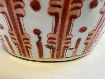 Lot 76 - A CHINESE IRON-RED 'LOTUS' VASE, QING DYNASTY, 19TH CENTURY