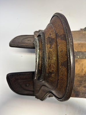 Lot 2 - A TIBETAN SADDLE, BRIDLE, AND A PAIR OF STIRRUPS, 18TH/19TH CENTURY OR EARLIER