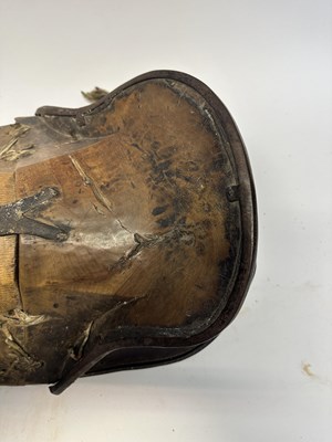 Lot 2 - A TIBETAN SADDLE, BRIDLE, AND A PAIR OF STIRRUPS, 18TH/19TH CENTURY OR EARLIER