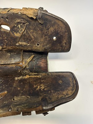 Lot 2 - A TIBETAN SADDLE, BRIDLE, AND A PAIR OF STIRRUPS, 18TH/19TH CENTURY OR EARLIER