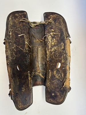 Lot 2 - A TIBETAN SADDLE, BRIDLE, AND A PAIR OF STIRRUPS, 18TH/19TH CENTURY OR EARLIER