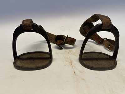 Lot 2 - A TIBETAN SADDLE, BRIDLE, AND A PAIR OF STIRRUPS, 18TH/19TH CENTURY OR EARLIER