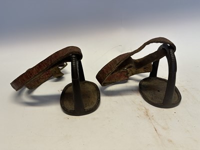 Lot 2 - A TIBETAN SADDLE, BRIDLE, AND A PAIR OF STIRRUPS, 18TH/19TH CENTURY OR EARLIER