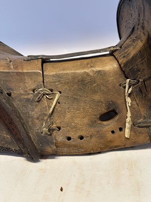 Lot 2 - A TIBETAN SADDLE, BRIDLE, AND A PAIR OF STIRRUPS, 18TH/19TH CENTURY OR EARLIER