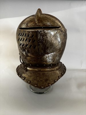 Lot 553 - A CLOSE-HELMET IN LATE 16TH/EARLY 17TH CENTURY STYLE, 19TH CENTURY