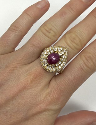 Lot 349 - RUBY AND DIAMOND CLUSTER RING. 1980s