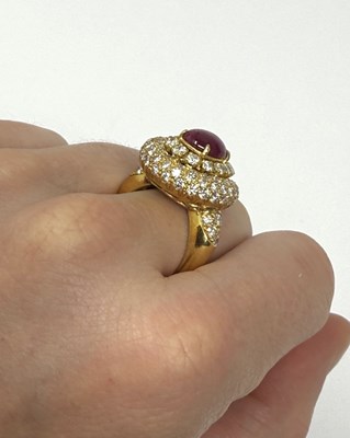 Lot 349 - RUBY AND DIAMOND CLUSTER RING. 1980s