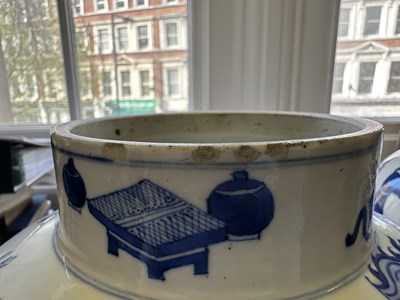 Lot 11 - A LARGE PAIR OF CHINESE BLUE AND WHITE 'HUNDRED BOYS' VASES AND COVERS, QING DYNASTY, 18TH CENTURY