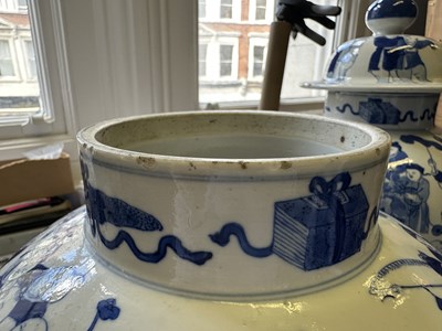 Lot 11 - A LARGE PAIR OF CHINESE BLUE AND WHITE 'HUNDRED BOYS' VASES AND COVERS, QING DYNASTY, 18TH CENTURY