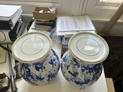 Lot 11 - A LARGE PAIR OF CHINESE BLUE AND WHITE 'HUNDRED BOYS' VASES AND COVERS, QING DYNASTY, 18TH CENTURY