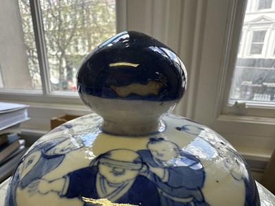 Lot 11 - A LARGE PAIR OF CHINESE BLUE AND WHITE 'HUNDRED BOYS' VASES AND COVERS, QING DYNASTY, 18TH CENTURY