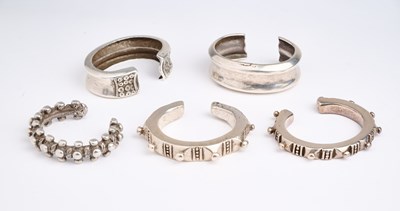 Lot 34 - FIVE SILVER BRACELETS, EASTERN INDONESIAN ARCHIPELAGO, 19TH/EARLY 20TH CENTURY