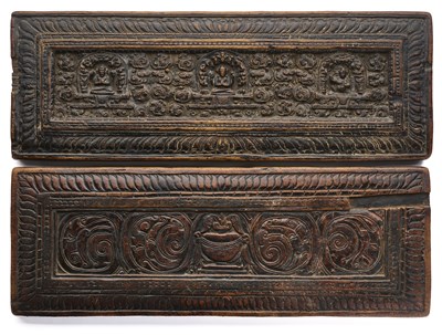 Lot 113 - TWO CARVED WOOD BOOKCOVERS, TIBET, 15TH/16TH CENTURY