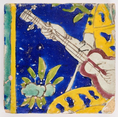 Lot 109 - A CUERDA SECA TILE DEPICTING A MUSICIAN, PERSIA, 18TH/19TH CENTURY