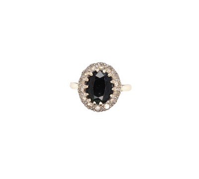 Lot 407 - SAPPHIRE AND DIAMOND RING