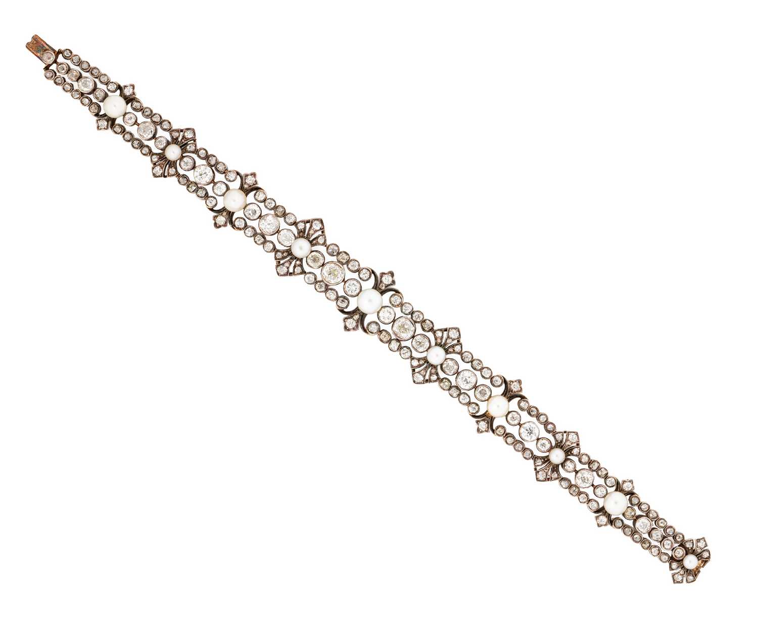 Lot 390 - DIAMOND AND PEARL BRACELET, 1890s