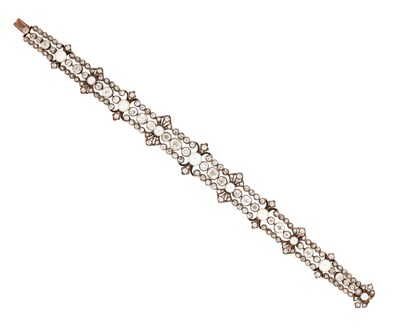 Lot 496 - DIAMOND AND PEARL BRACELET, 1890s