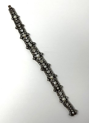 Lot 390 - DIAMOND AND PEARL BRACELET, 1890s