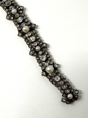 Lot 390 - DIAMOND AND PEARL BRACELET, 1890s