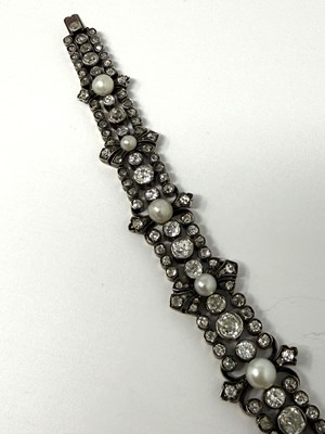 Lot 390 - DIAMOND AND PEARL BRACELET, 1890s
