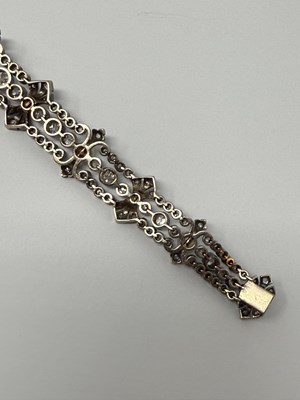 Lot 390 - DIAMOND AND PEARL BRACELET, 1890s