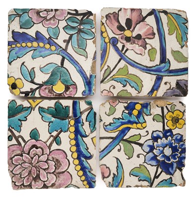 Lot 104 - FOUR QAJAR CUERDA SECA TILES, SHIRAZ, PERSIA, 19TH CENTURY