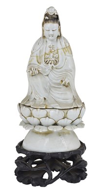 Lot 63 - A CHINESE BLANC DE CHINE FIGURE OF GUANYIN