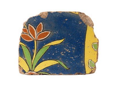 Lot 111 - A MUGHAL TILE FRAGMENT FROM THE GATEWAY TO THE TOMB OF MADANI, SRINAGAR, MID-17TH CENTURY