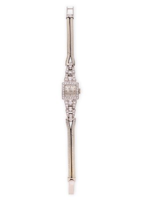 Lot 331 - OMEGA: LADY'S WHITE GOLD AND DIAMOND COCKTAIL WATCH, 1950s