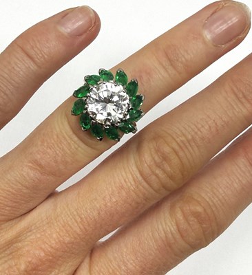 Lot 391 - EMERALD AND DIAMOND RING, 1960s